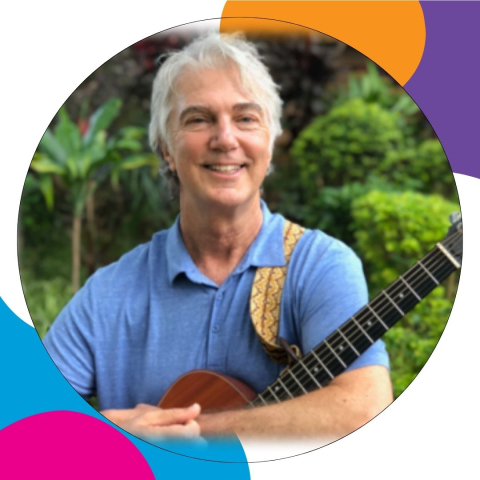 Image of performer Craig Newton with guitar